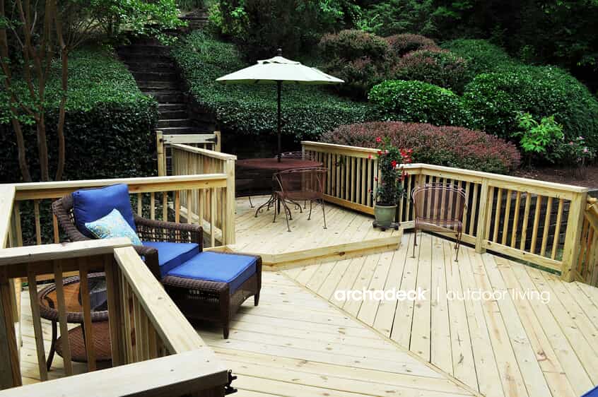wooden deck with raised seating